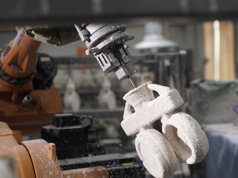 機械（xiè）手臂沾漿製殼